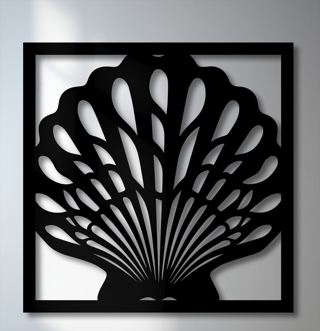 The smooth surface texture of this unique metal wall art forms a striking seashell frame with deep, intricate cutouts that cast captivating shadows.