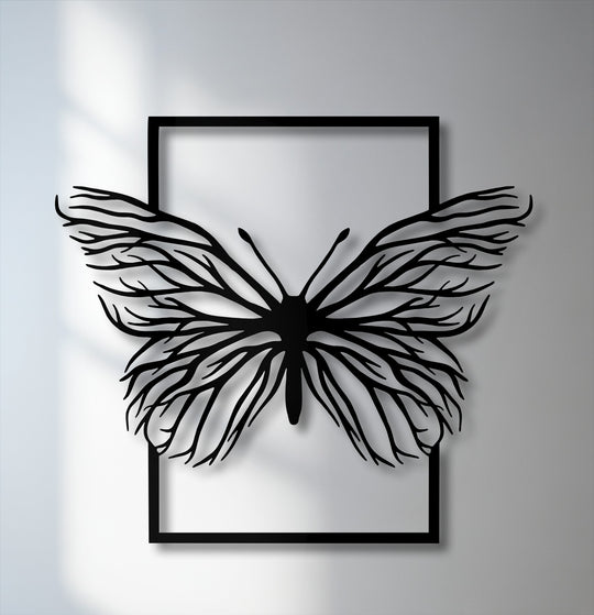 The brightest area, a crisp white background, emphasizes the ethereal butterfly frame metal art for wall's elegant nature silhouette.