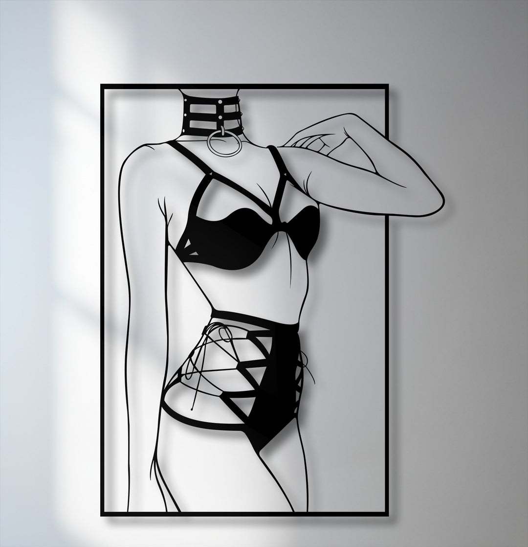 Stark color contrast highlights the sleek black minimalist female silhouette metal wall decor with modern line art against a bright background.
