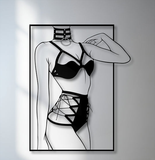 Stark color contrast highlights the sleek black minimalist female silhouette metal wall decor with modern line art against a bright background.