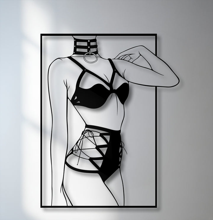 Stark color contrast highlights the sleek black minimalist female silhouette metal wall decor with modern line art against a bright background.