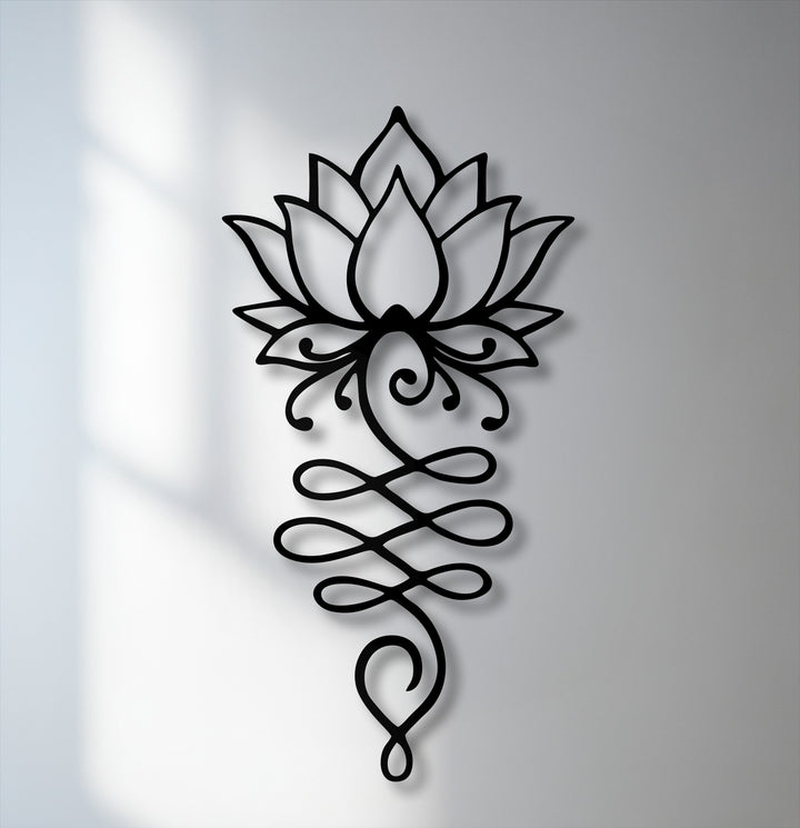 A gentle transition from bright white to soft gray on the wall beautifully frames the intricate lotus flower symbol unique metal wall art.