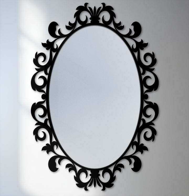 Foreground shows the ornate black metal scroll leaf frame of an imperial oval floor mirror, bringing a touch of unique metal wall art as home decoration.