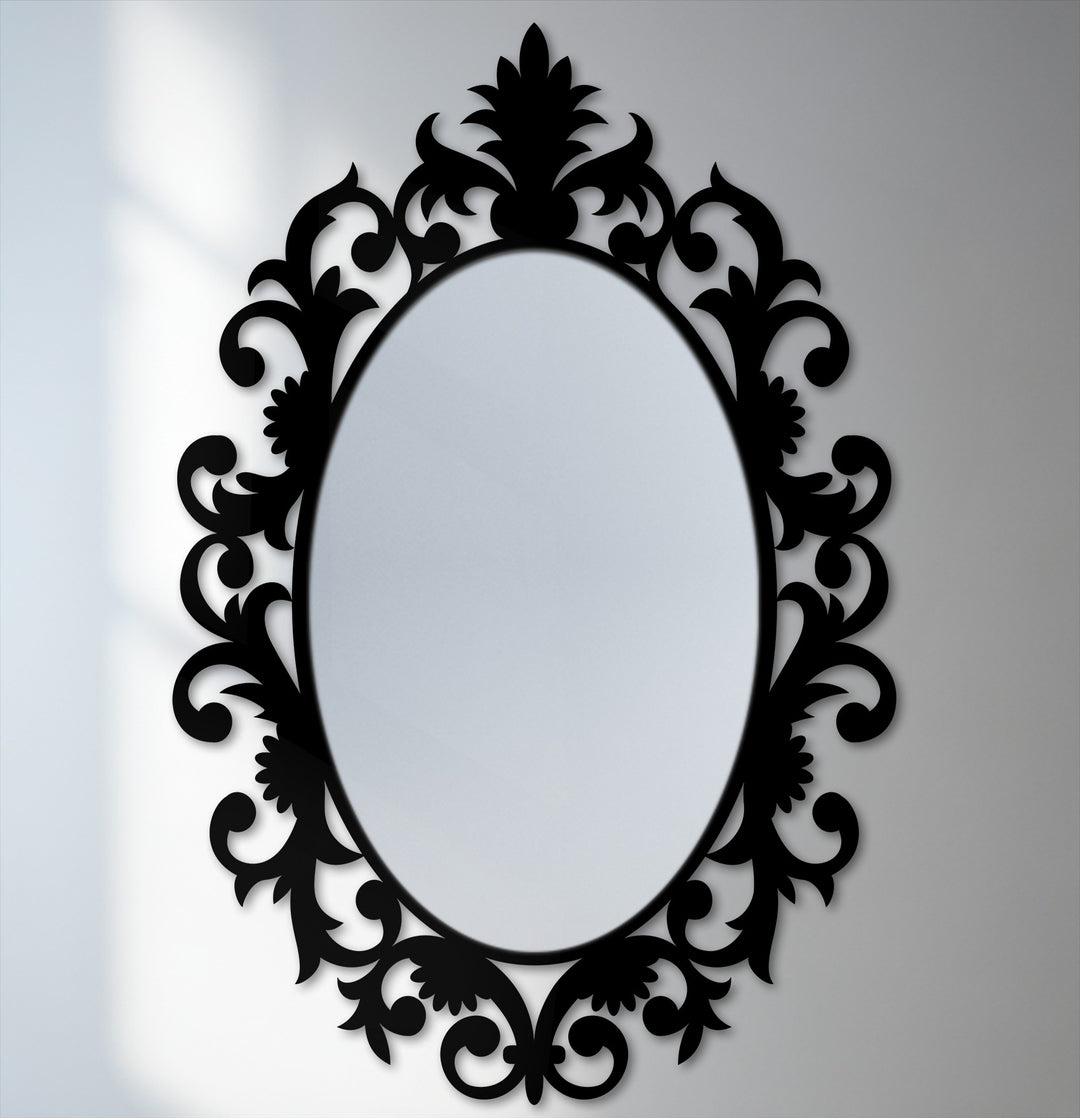 Sunlight creates dancing light and shadow patterns highlighting the ornate details of the majestic crowned baroque oval floor mirror, adding depth to this stunning stained glass wall mirror.
