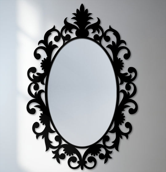 Sunlight creates dancing light and shadow patterns highlighting the ornate details of the majestic crowned baroque oval floor mirror, adding depth to this stunning stained glass wall mirror.