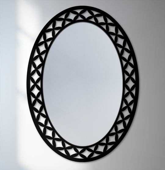 The darkest area highlights the geometric petal designs of the frame, making this oval floor mirror a striking piece of decorative mirror.