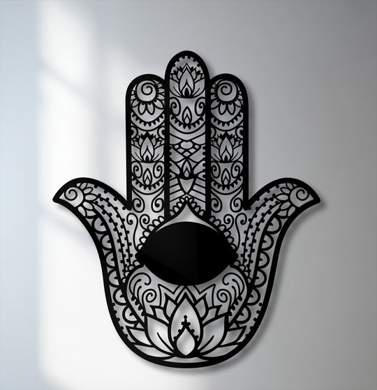 The exceptional material quality of this metal decoration wall art is highlighted by the precision-cut Hamsa hand with an evil eye.