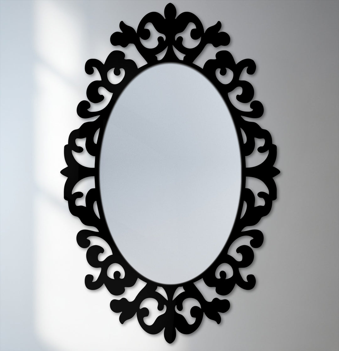 Bold black baroque frame dramatically contrasts with the reflective surface of this ornate oval floor mirror, ideal for decorating with wall mirrors.