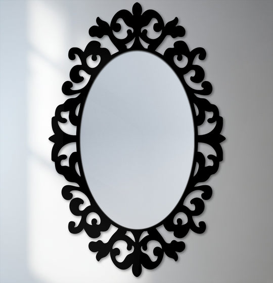 Bold black baroque frame dramatically contrasts with the reflective surface of this ornate oval floor mirror, ideal for decorating with wall mirrors.