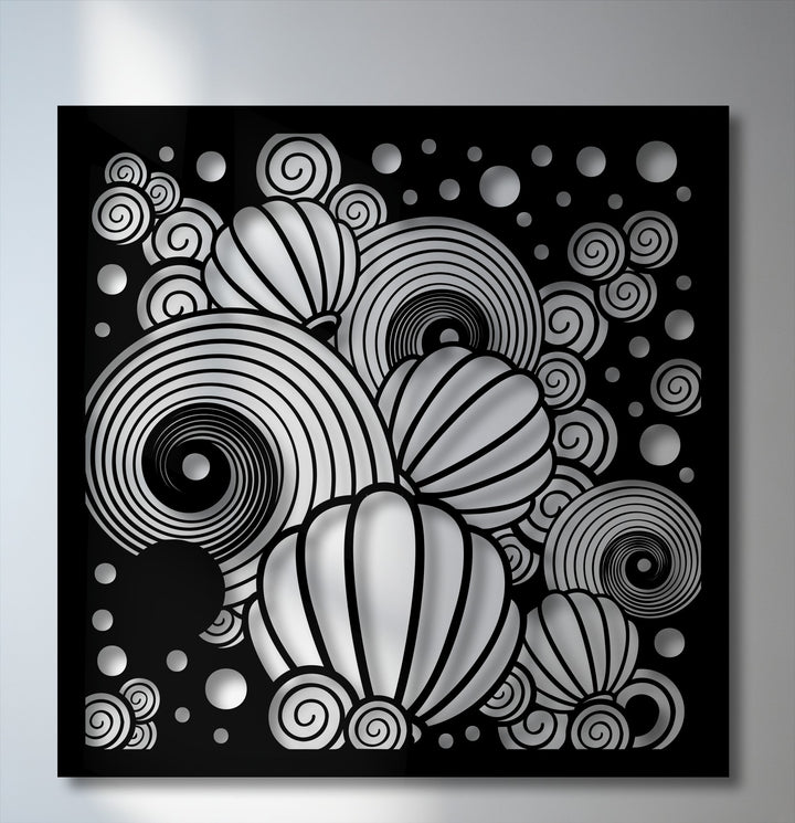 Interlocking abstract balloon shapes and swirling spirals create a dynamic visual rhythm in this unique metal wall art.
