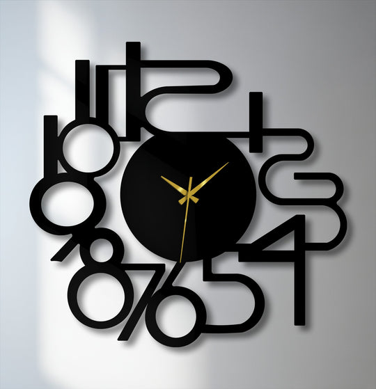 The sleek, matte black surface texture of this modern abstract numbers metal artwork wall clock creates crisp shadows.