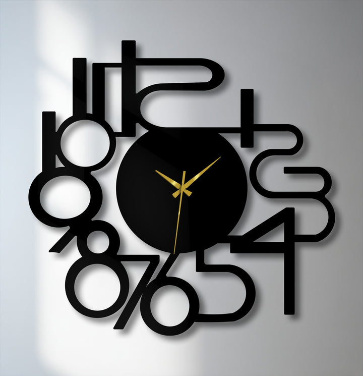 The sleek, matte black surface texture of this modern abstract numbers metal artwork wall clock creates crisp shadows.