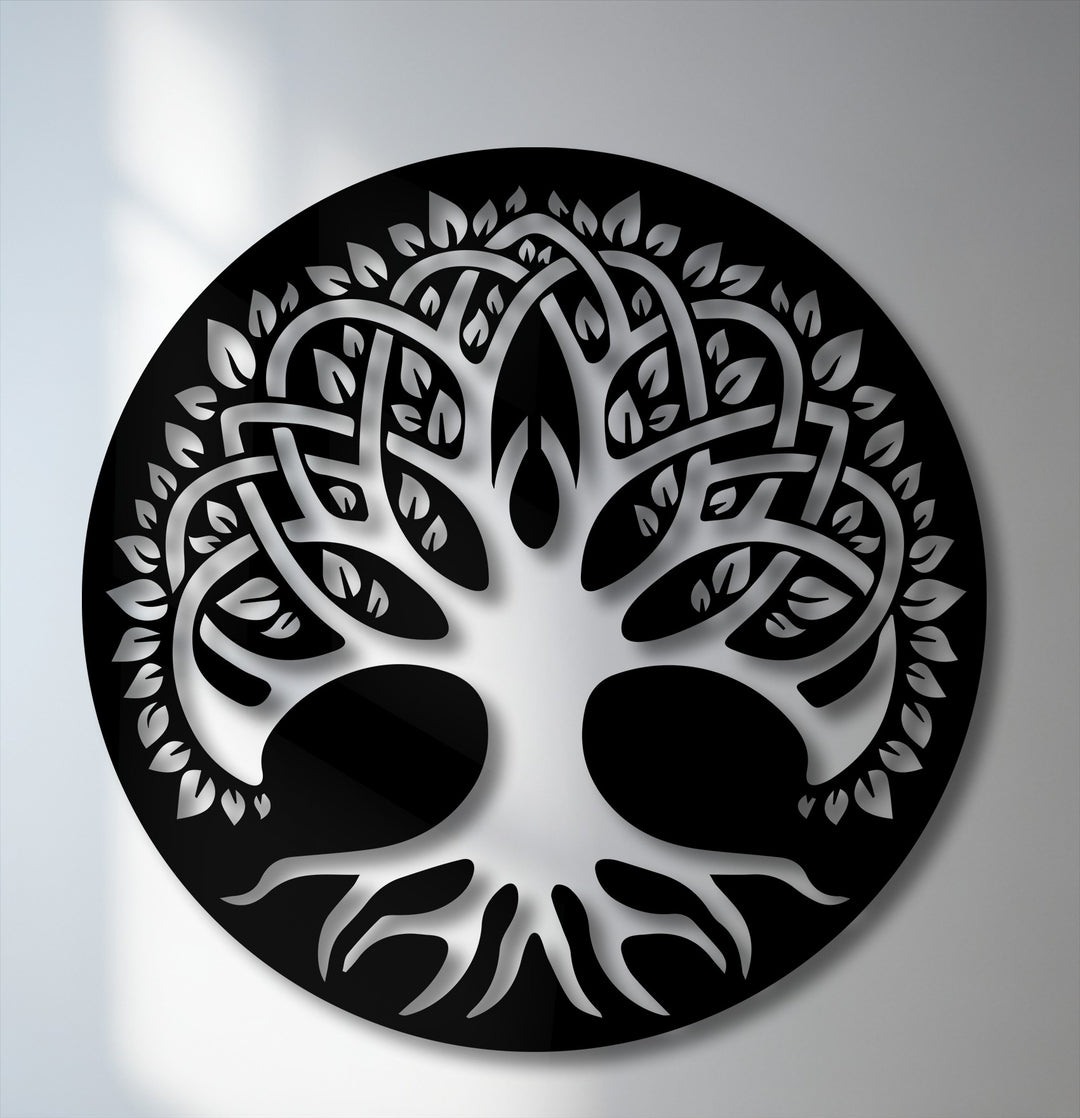 The smooth, defined black circular edge of the Celtic-inspired Sacred Tree of Life metal wall decor elegantly frames the intricate design.
