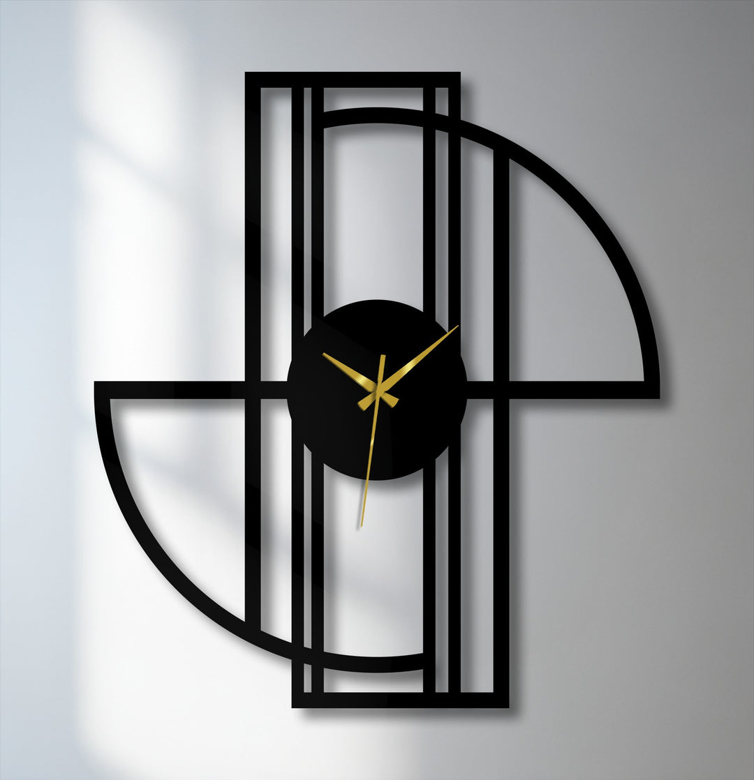 Foreground shows a decorative metal art clock featuring a modern minimalist geometric frame with curved lines and gold hands.