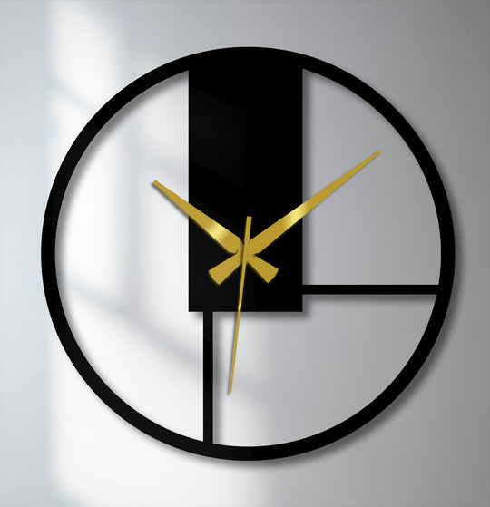 Bold black lines create a striking color contrast against the clock's gray background, highlighting the metal wall decor of this minimal geometric clock.