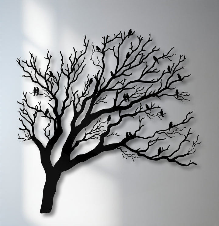 The graceful shadows cast by the branches and birds on this nature silhouette metal art for wall create a sense of swaying movement.