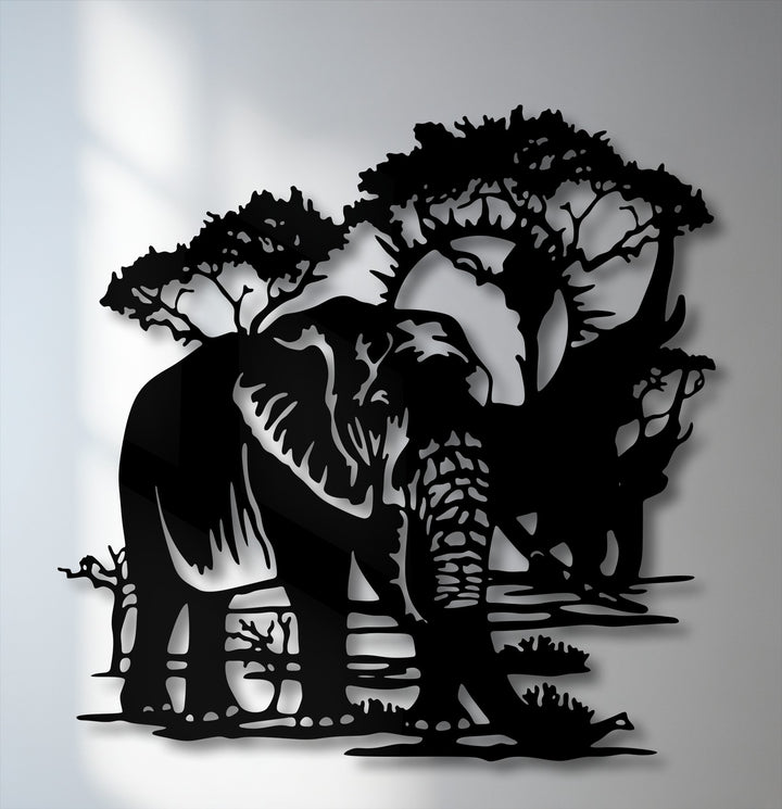 The realistic detail of this majestic safari elephant decoration wall art showcases intricate trees and the powerful animal in a striking metal silhouette.