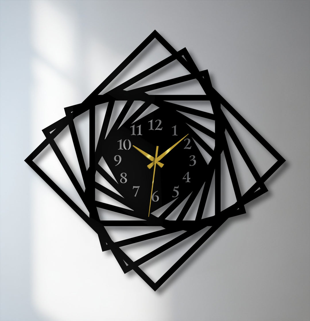 Negative space intricately reveals the dynamic spiral geometric design of this modern black metal art for wall clock.