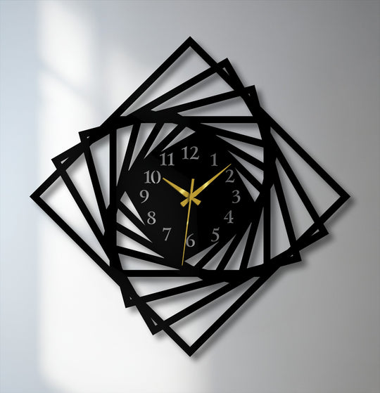 Negative space intricately reveals the dynamic spiral geometric design of this modern black metal art for wall clock.