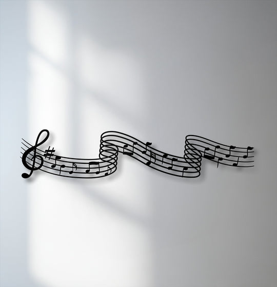 Abstract flowing melody notes metal artwork create a dynamic and elegant musical design on a light background.