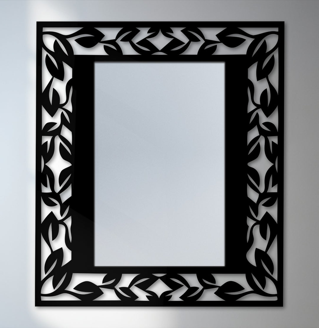 Fine, textured metal art for wall enhances the leaf pattern frame of this metal wall mirror, adding depth to its elegant botanical border design.