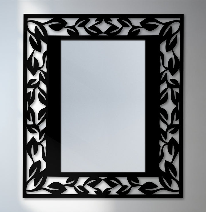 Fine, textured metal art for wall enhances the leaf pattern frame of this metal wall mirror, adding depth to its elegant botanical border design.