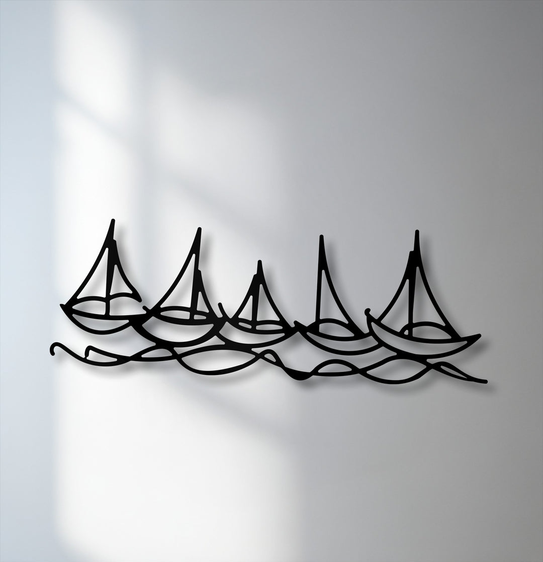 The visual rhythm of five black sailboat silhouettes riding continuous waves creates a captivating decoration wall art piece.
