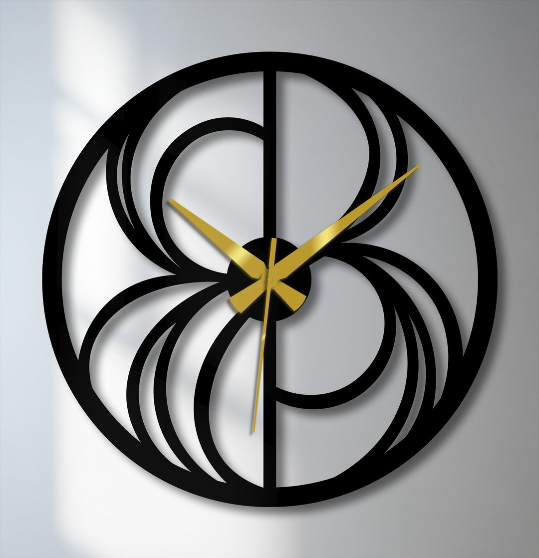 Black is the dominant color in this abstract swirl metal wall clock featuring a geometric design, serving as a striking piece of decorative metal art.