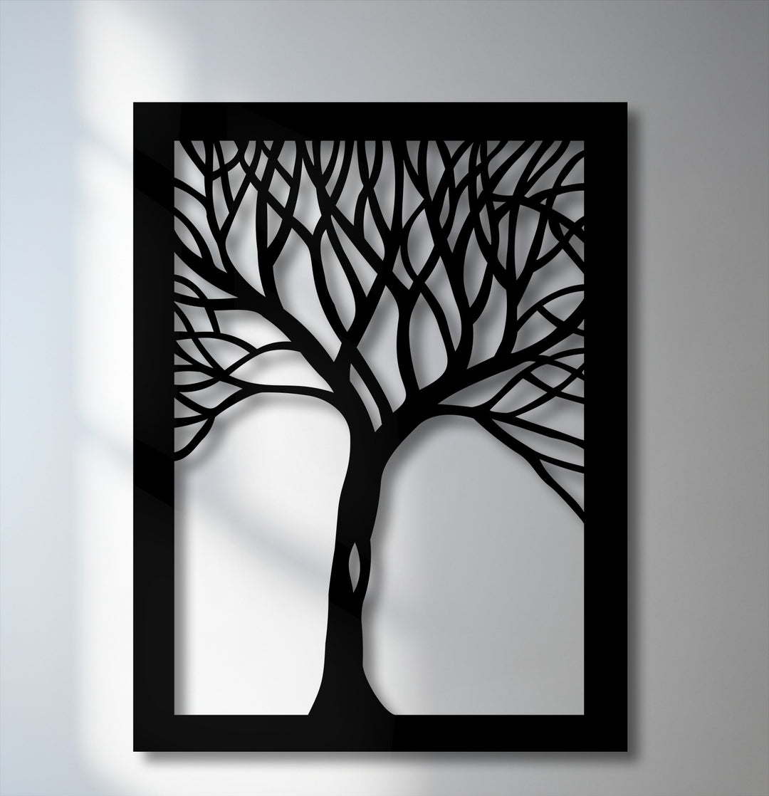 The matte black finish of this abstract tree silhouette decorative metal art creates striking depth and shadow effects on the wall.