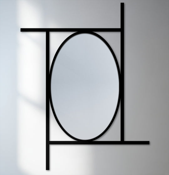 Subtle light and shadow play across this offset frame oval wall mirror, accentuating its geometric design and highlighting the minimalist beauty of the framed wall mirror.