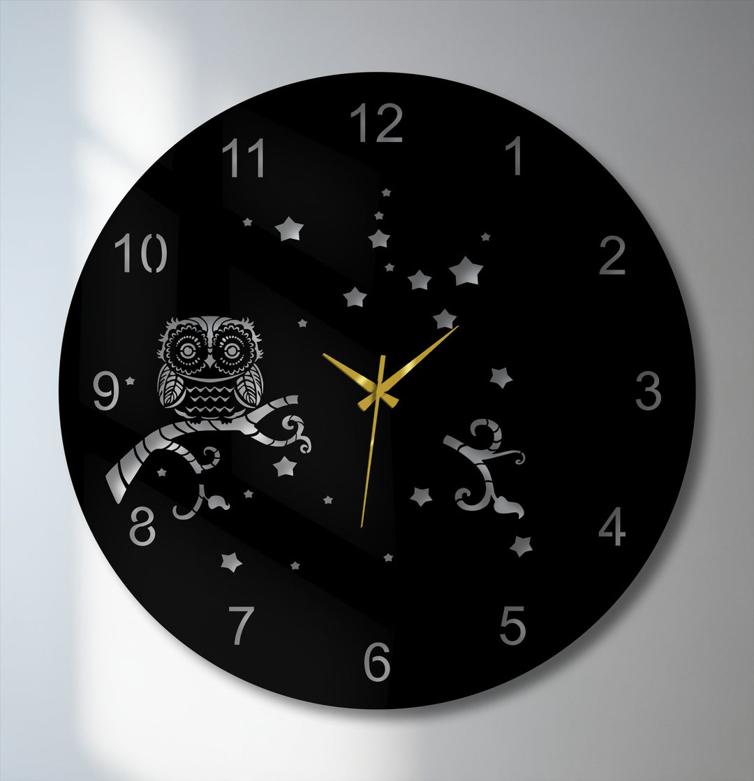 The background of this metal artwork clock is a glossy black surface with subtle reflections and a twinkling starry sky design.