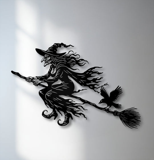 The dramatic layering effect of this flying witch metal art for wall is highlighted by its deep shadow, adding gothic depth to Halloween decor.