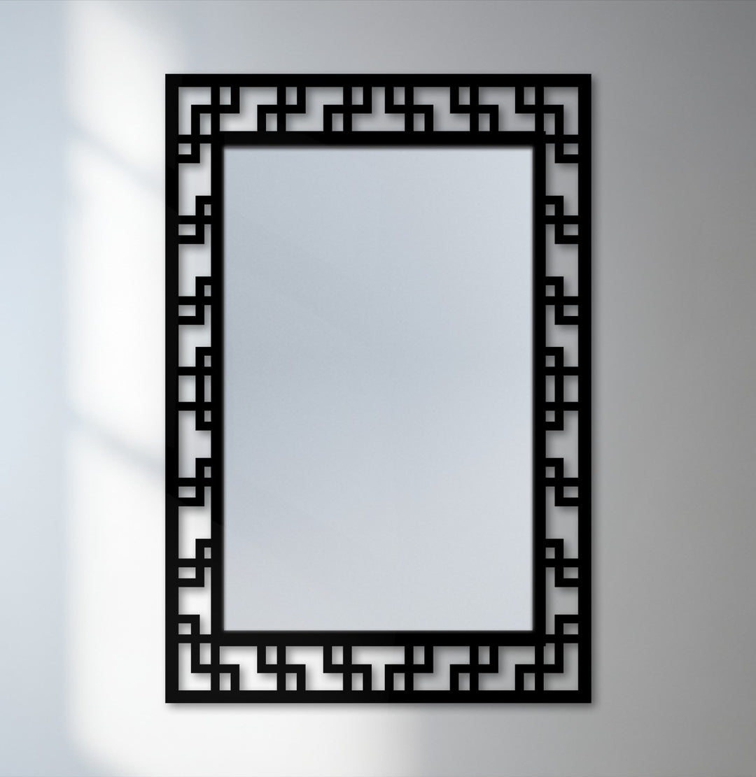 The focal point of this geometric maze pattern floor mirror showcases its sleek, modern design as a piece of unique metal wall art.