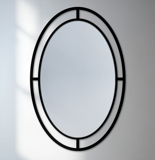 Smooth surface texture on this oval architectural style modern wall mirrors featuring a segmented frame.
