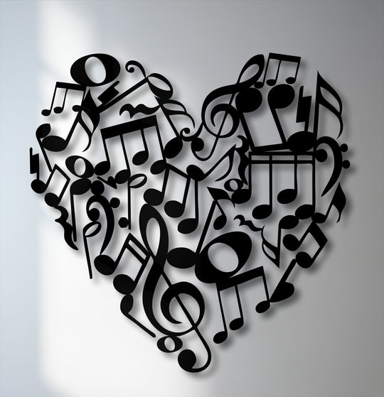 The intricate arrangement of black music notes and symbols forming a heart is the focal point of this metal art for wall.