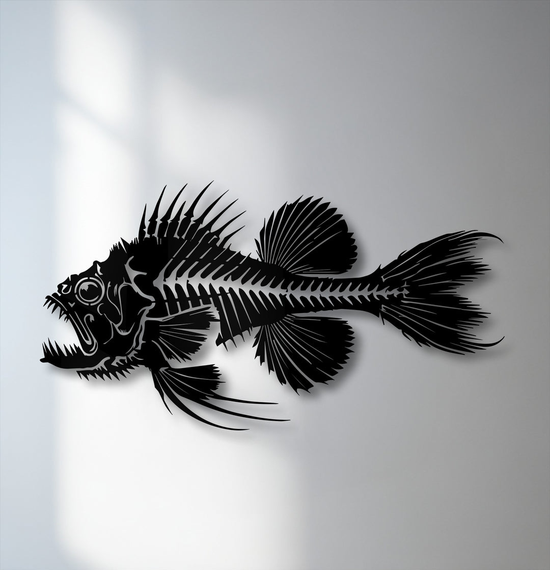 Horizontally oriented, this detailed silhouette of a predatory fish skeleton makes striking metal art for wall decor.
