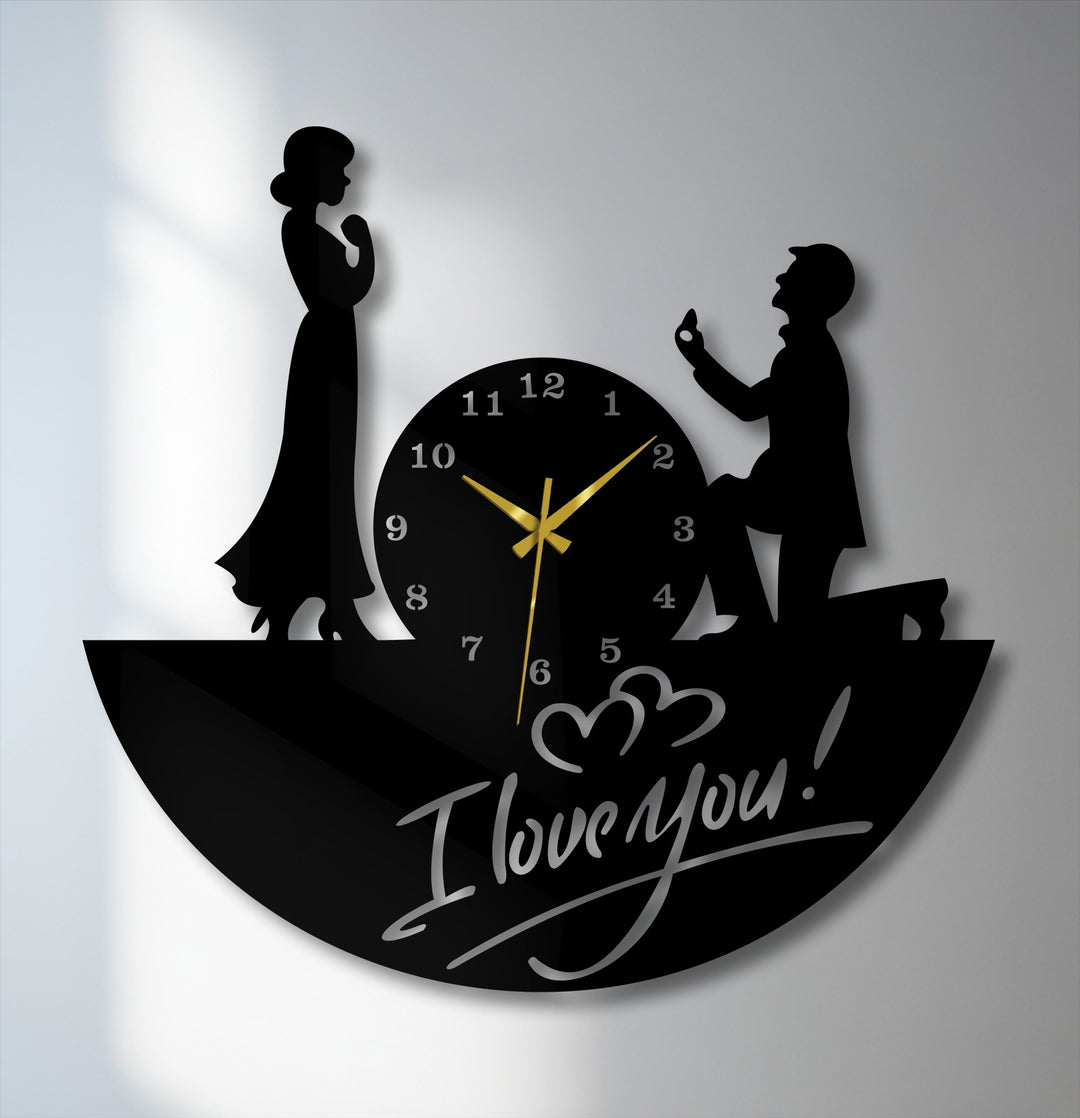 Expressing a tender ambiance, the love proposal metal wall clock showcases a couple silhouette, ideal decoration wall art for romantic moments and gifting.
