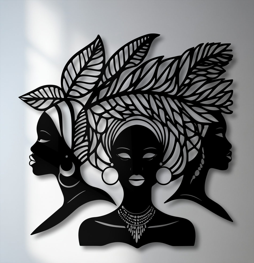 Emphasizing the layering effect, this decorative metal art portrays three African women silhouettes, creating visual depth for cultural portrait decor.