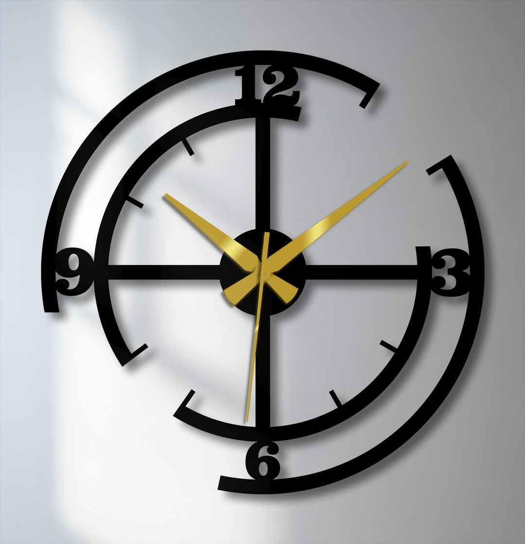 Blurred background contrasts with the modern black geometric design of this decorative metal artwork wall clock, highlighting its minimalist style.