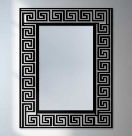 Intricate layering emphasizes the black metal decorative metal art frame with a Greek key pattern surrounding this elegant bathroom mirror.