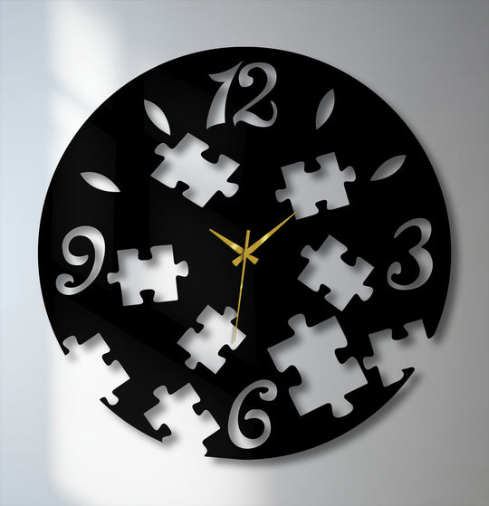 The puzzle pieces form a unique and abstract metal art for wall within the contemporary Puzzle Pieces Metal Wall Clock, showcasing gold hands.