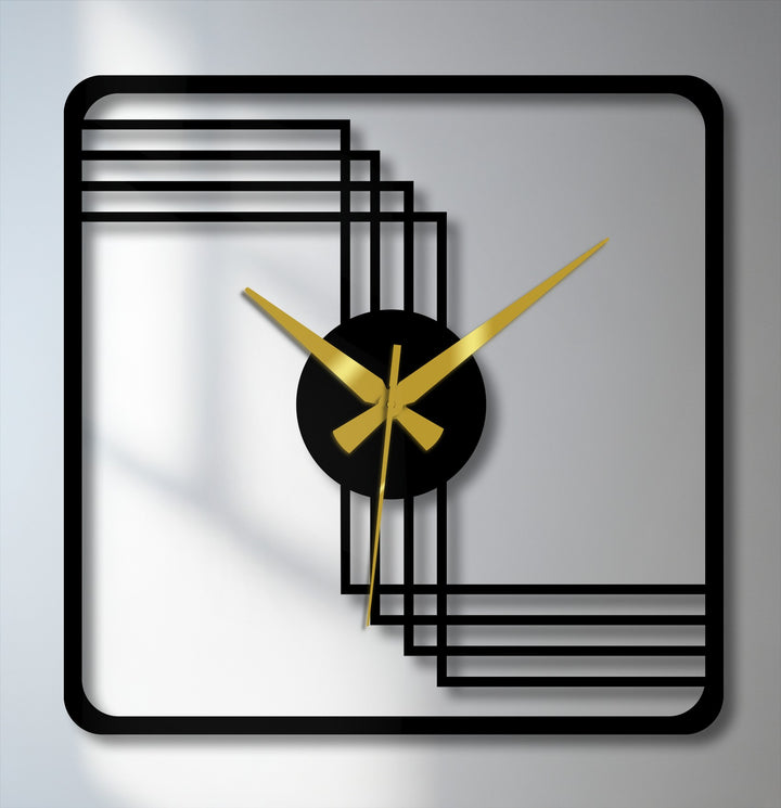 The realistic detail shows the sleek, square frame and geometric design of this modern metal art for wall clock, enhanced by contrasting gold hands.