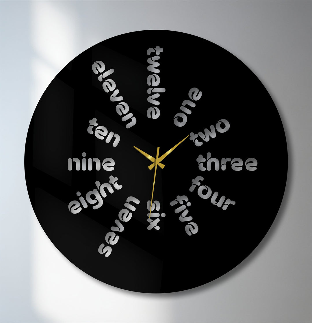 Bold contrast defines this modern Word Time metal wall clock with its sleek black surface and striking silver word hour markers, showcasing a distinctive print wall art style.