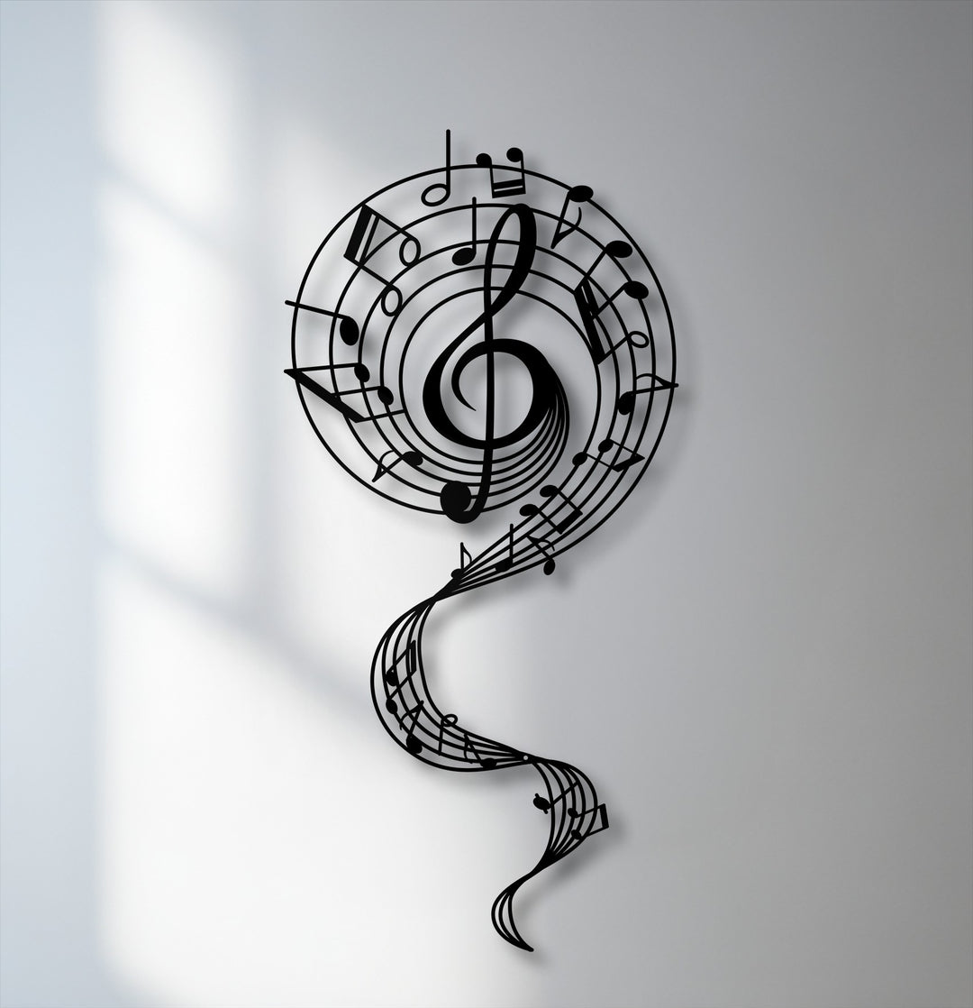 The stillness of this striking black metal artwork beautifully captures a grand treble clef with a graceful, flowing melody of musical notes.