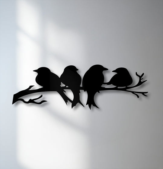 The serene mood of this decorative metal art features quiet silhouette birds perched on a branch, creating peaceful metal wall art.