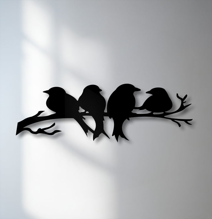 The serene mood of this decorative metal art features quiet silhouette birds perched on a branch, creating peaceful metal wall art.