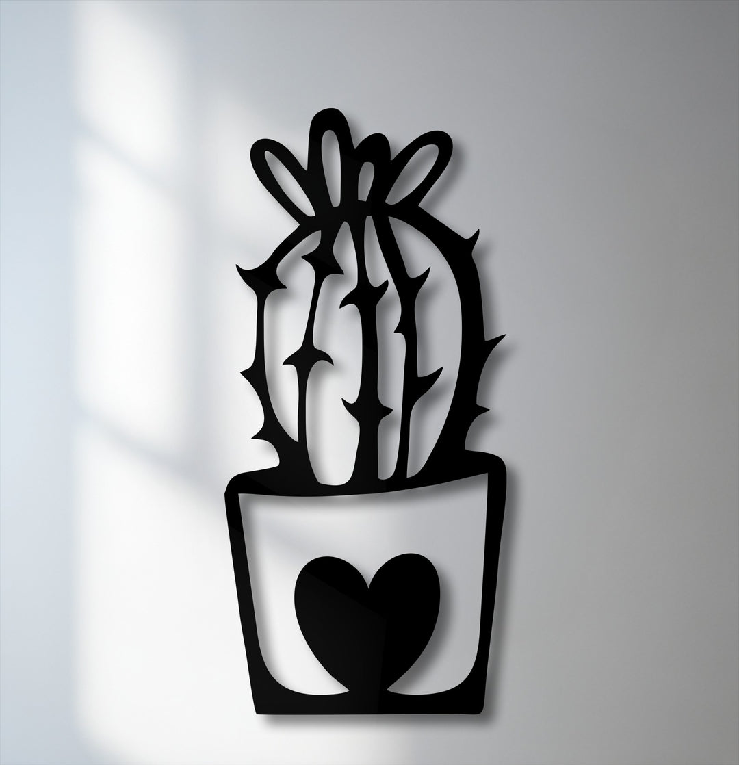 The premium material quality of this precision-cut black metal cactus in a heart pot makes for striking decoration wall art.