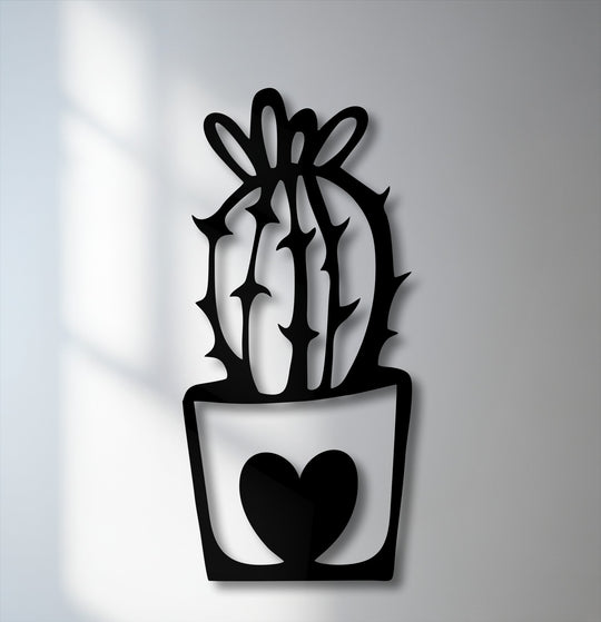The premium material quality of this precision-cut black metal cactus in a heart pot makes for striking decoration wall art.