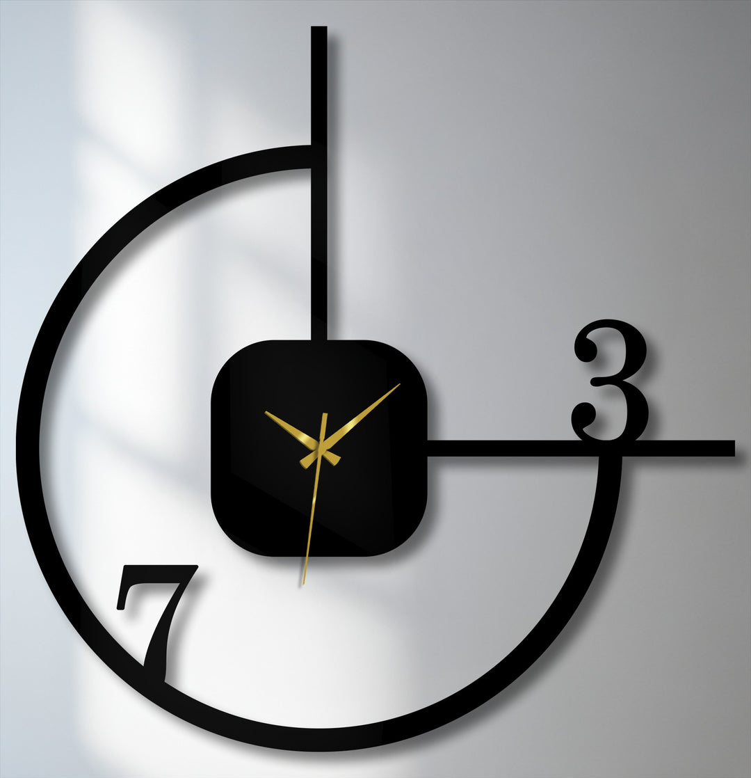 Showcasing the geometric elements, this minimalist metal wall clock presents a striking circle design as an eye-catching piece of decorative metal art.