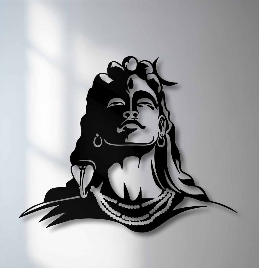 The sleek black finish of this Lord Shiva metal wall decor creates a striking silhouette with elegant shadows.